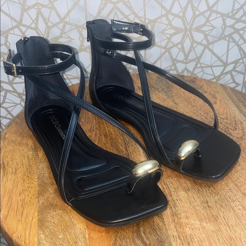 BCBGMaxAzria Black Sandals with Metallic Accents